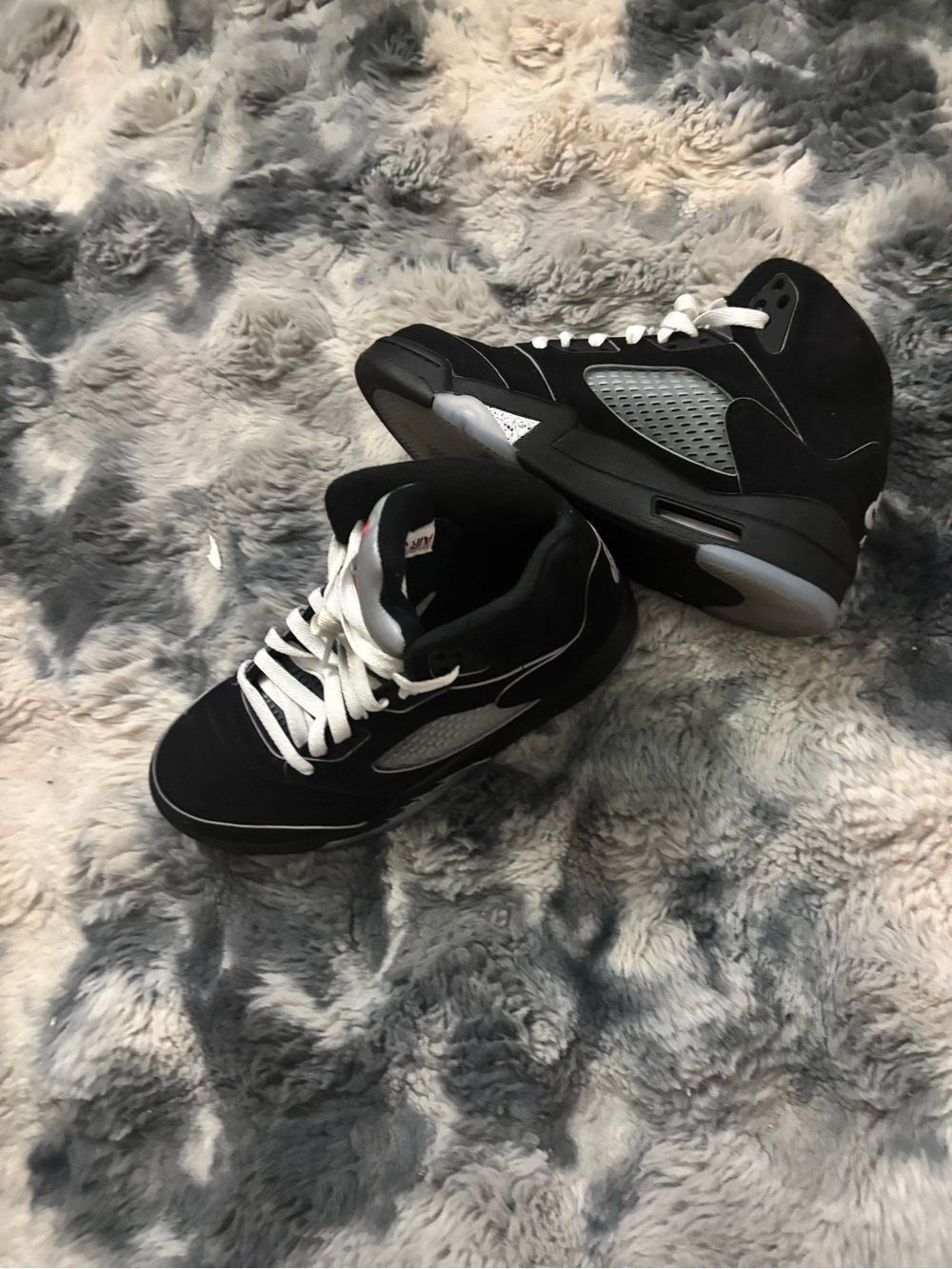 Jordan Black and White Mid-Top Sneakers